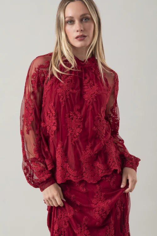 Blusa Luna in pizzo floreale con maniche a sbuffo