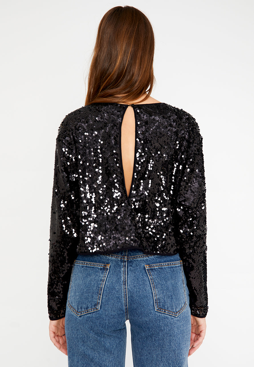 TOP AMPIO CON PAILLETTES