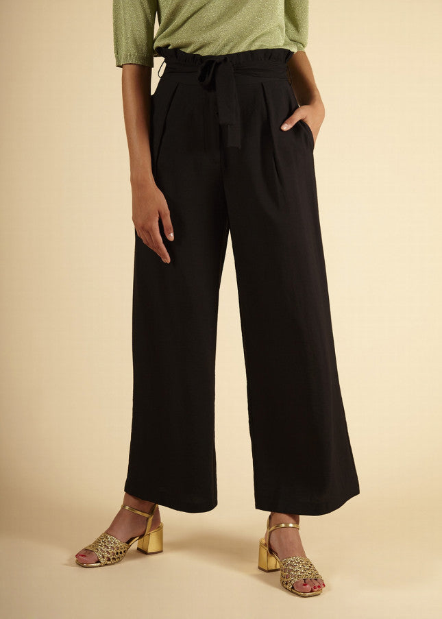 PANTALONE NERO SCAMPANATO CON ROUGES IN VITA